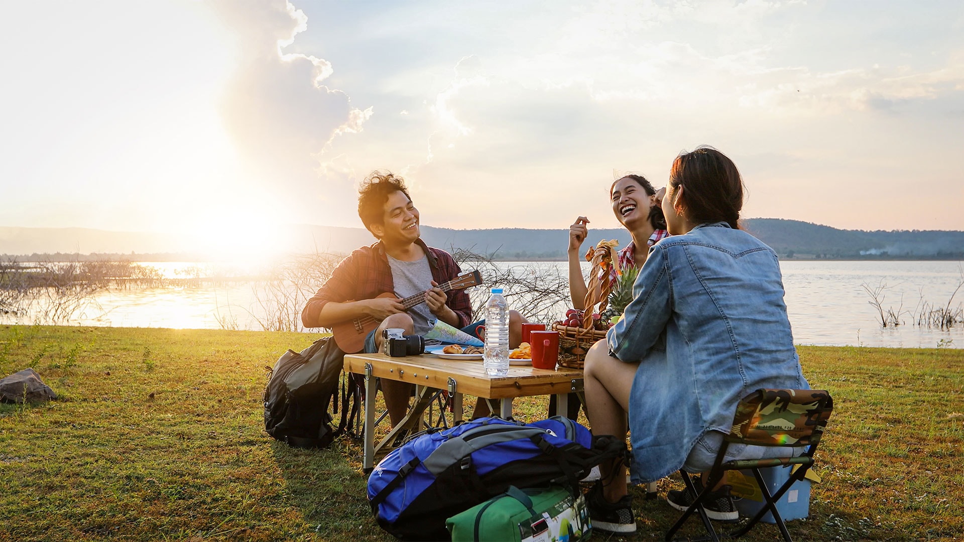 Friends having a picnic outside 
