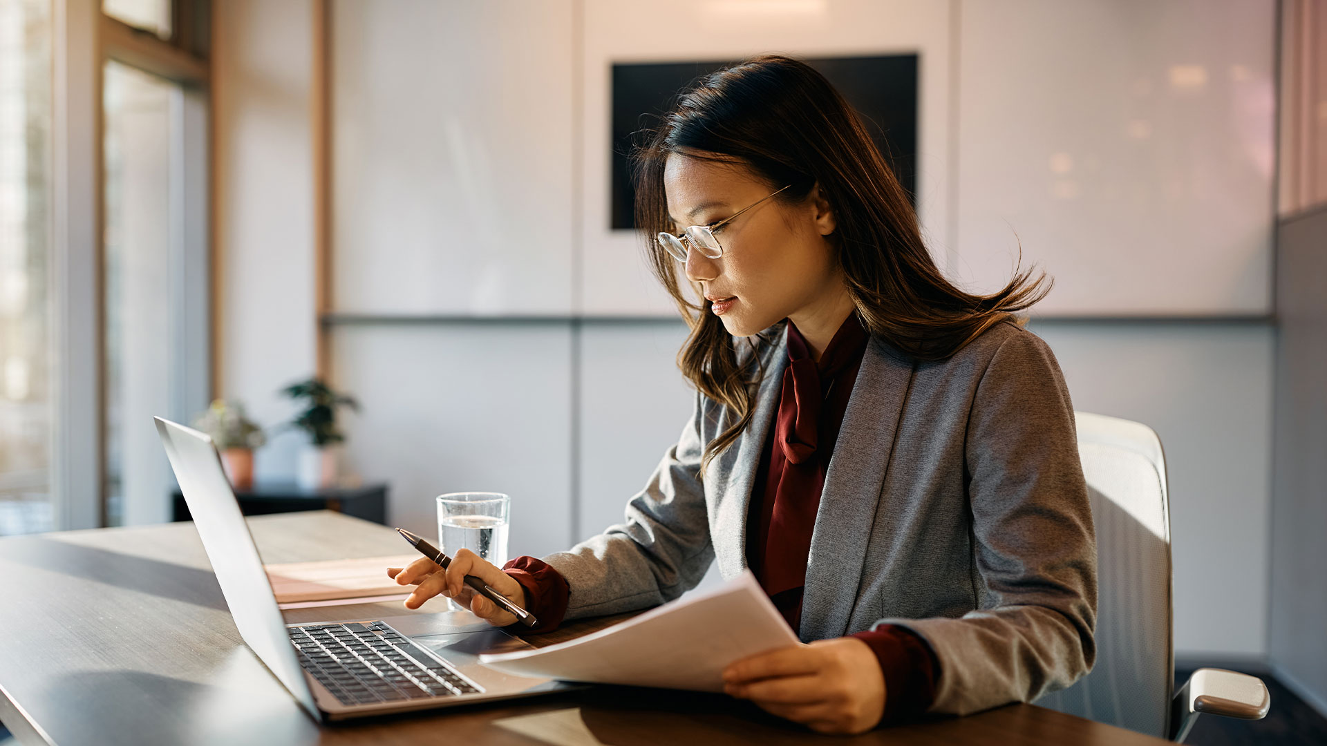 Image of man smiling at mobile phone